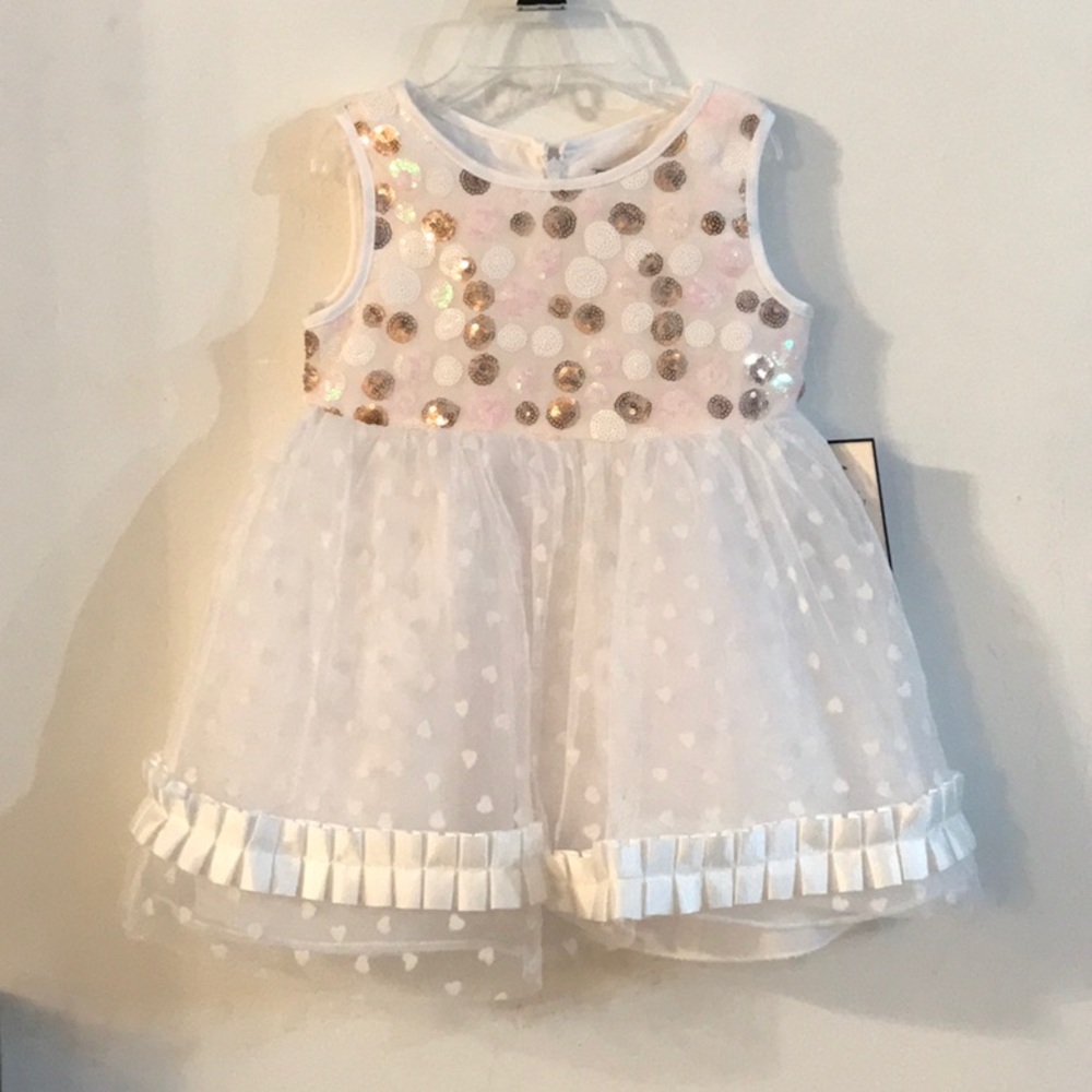 Dorissa stunning tule and sequin sleeveless dress.
